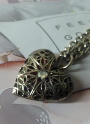 Цепочка с подвеской виде сердца.
