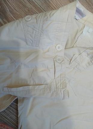 Молочні, бежеві шорти з кишенями з боків9 фото
