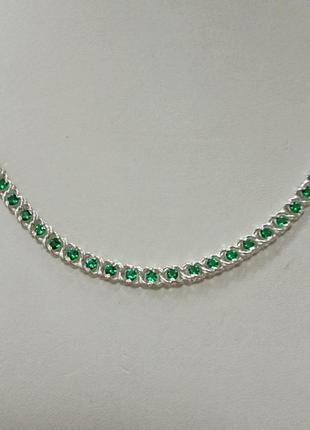 Серебряная женская цепочка с зелёными камнями1 фото