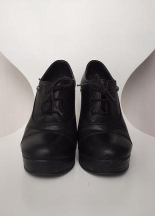 Чёрные кожаные ботинки на шнуровке2 фото