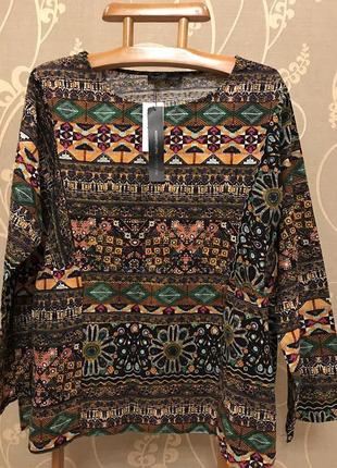 Нереальної краси брендовий блузка у візерунках..100% коттон.