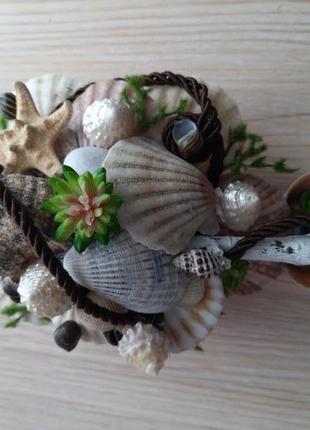 Интерьерная композиция с морскими и океаническими ракушками.