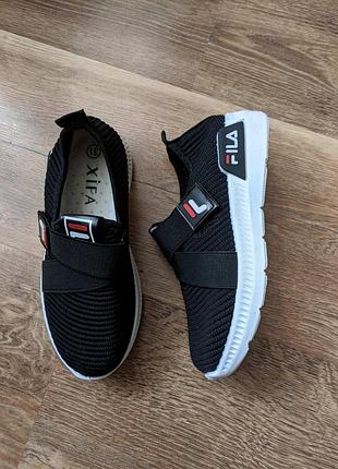 Текстильні кросівки