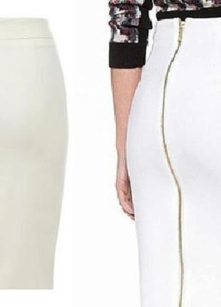Белая юбка на молнии.нюанс-пятнышко сзади1 фото