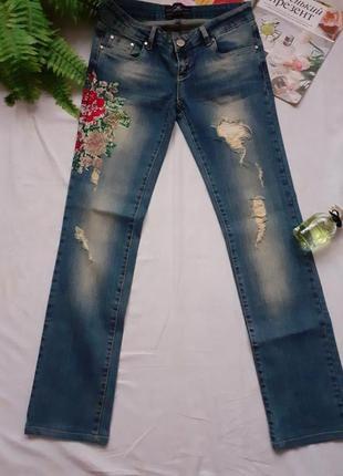 Шикарные  брендовые джинсы  с рваностями и стразами 🌹1 фото