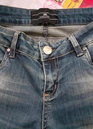 Шикарные  брендовые джинсы  с рваностями и стразами 🌹2 фото