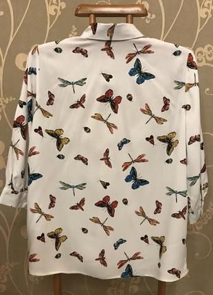 Нереально красивая и стильная брендовая блузка в бабочках...100% вискоза.3 фото