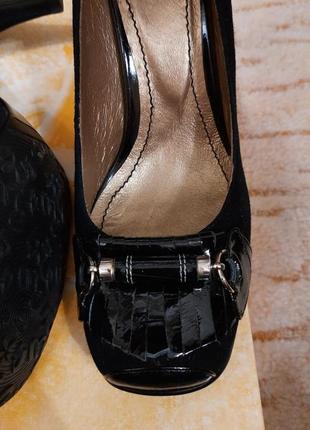 Новые кожаные черные  туфли на среднем каблуке2 фото