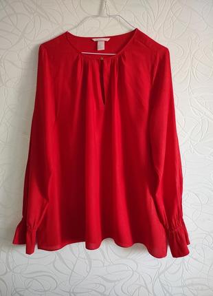 Ярко-оранжевая блузка