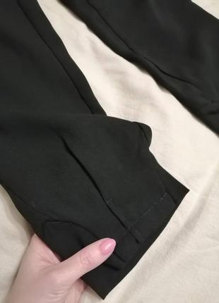 Жіночі брюки gloria jeans чорного кольору9 фото