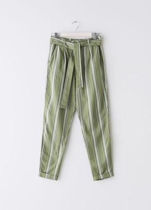 Штани з високою посадкою