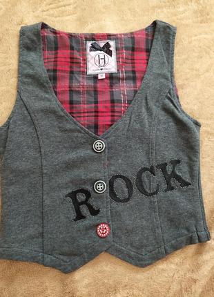 Стильные жилетки