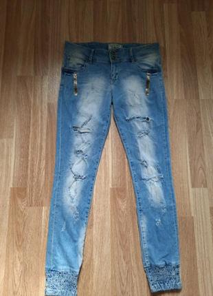 Джинсі/рвані джинси з манжетами1 фото