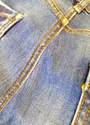 Узкие джинсы с принтом мики маусом9 фото
