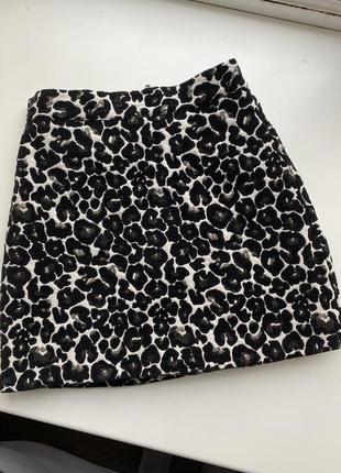 Мини юбка с леопардовым принтом1 фото