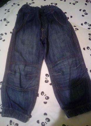 Джинсові штани.