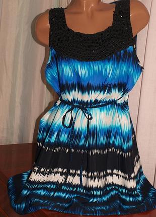 Гарний сарафан (хл виміри) прикрашений намистинами ,під поясок, відмінно виглядає.