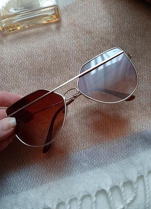 Коричневі окуляри