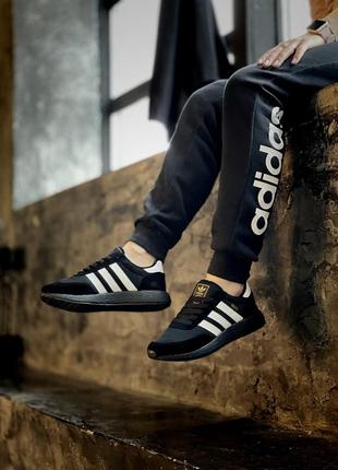 Шикарні жіночі кросівки adidas iniki чорні з білими смужками унісекс 36-46 р1 фото