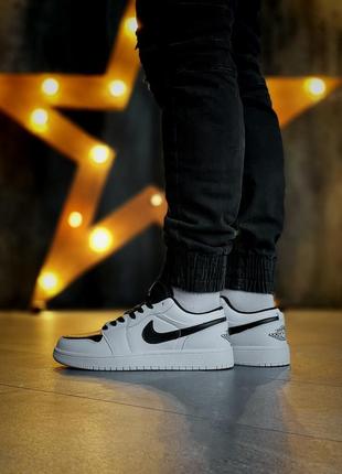 Відмінні чоловічі кросівки nike air jordan 1 low білі з чорним7 фото