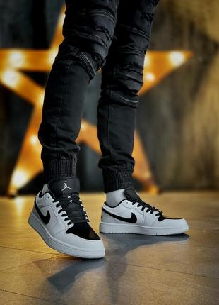 Відмінні чоловічі кросівки nike air jordan 1 low білі з чорним4 фото