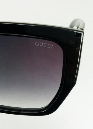 Gucci очки женские солнцезащитные большие черные с цветами на дужках9 фото