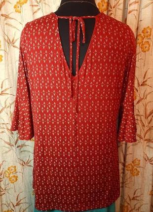 Красивая нарядная трикотажная блуза с украшениями большого размера3 фото