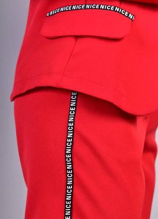Женский красный костюм пиджак и брюки 46-48р3 фото