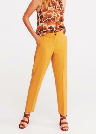 Женские желтые брюки сигареты со стрелками с высокой посадкой1 фото
