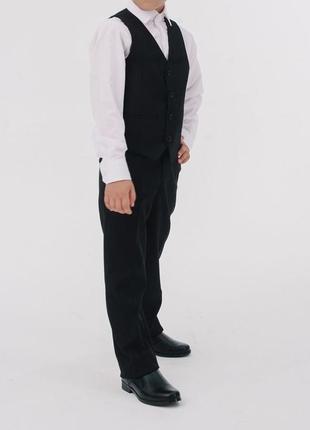 Брюки шкільні чорні класичні на хлопчика в школу брюки на резинці регуляторі tu- 7,8 років1 фото