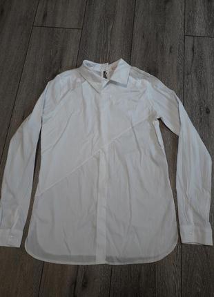 Біла блузка..1 фото