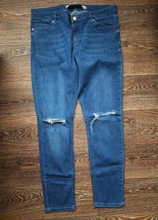 Рваные джинсы 14р.1 фото