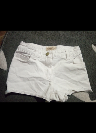 Шортки некст на дівчинку 7 років
