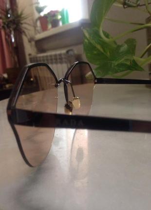 Елегантні ніжні сонцезахисні окуляри кольору "капучіно".3 фото