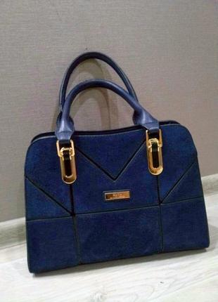 Синя сумочка з обробкою вельветовій