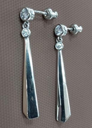 Серебряные женские серьги - гвоздики  и подвижной частью с золотой накладкой