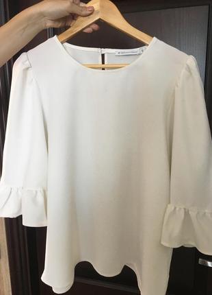 Блузка біла з широкими рукавами1 фото