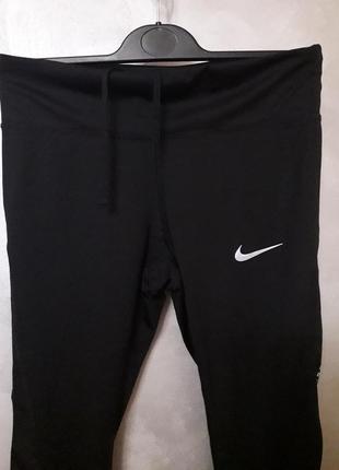 Капри бриджи тайтсы nike dri-fit7 фото