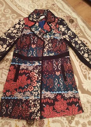 Пальто для жінки