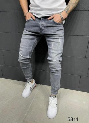 Джинсы мужские классические рваные серые / джинси класичні рвані штани варенки сірі2 фото