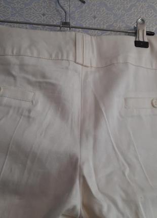 Белые, классические брюки3 фото