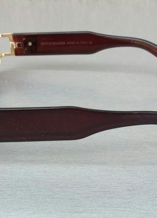 Gentle monster стильні сонцезахисні окуляри унісекс коричневі в золоті з сережкою3 фото