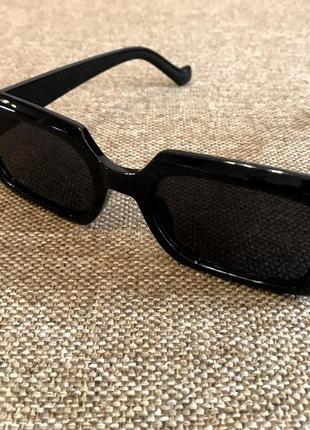 Новые солнцезащитные очки в чёрном цвете.8 фото