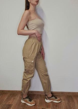 Брюки карго от prettylittlething