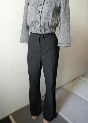 Класичні штани з срібною ниточкою, донизу кльош