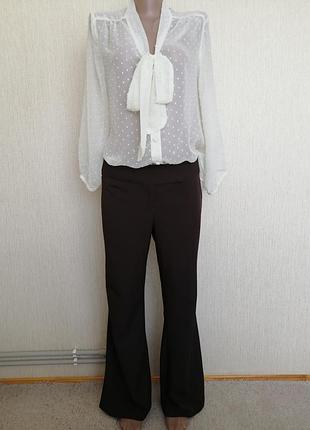 Коричневі брюки etam