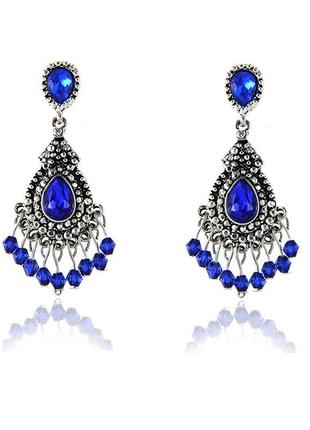 Східні сережки-гойдалки з синіми кристалами і гранованими намистинами