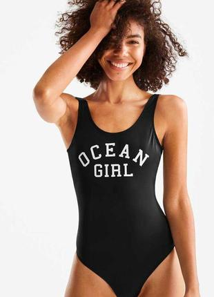 Чорний злитий купальник