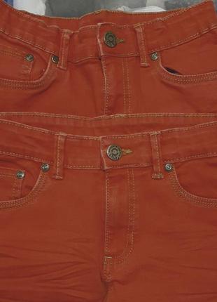 Морковно красные унисекс джинсы слимы yigga германия на10 лет (140см)