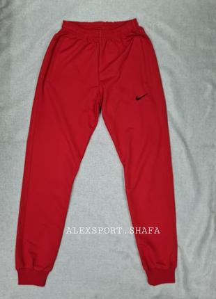 Спортивні штани nike завужені брюки на манжеті, тонкі штани найк, штани найк червоні5 фото